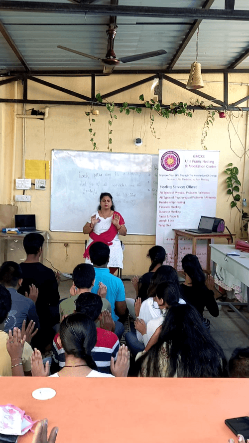 Pranic Healing training session – instructor and participants